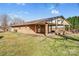 Charming brick home featuring a spacious covered porch, perfect for outdoor relaxation at 7270 Long Island Rd, Catawba, NC 28609