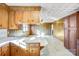 View of the kitchen and breakfast bar leading into the living room at 7270 Long Island Rd, Catawba, NC 28609