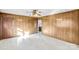 Bright living room with paneled walls, large window and neutral flooring at 7270 Long Island Rd, Catawba, NC 28609