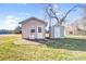 Outbuildings on the property, providing extra storage or workshop space with yard in the background at 7270 Long Island Rd, Catawba, NC 28609
