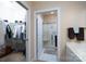 Bright bathroom with a walk in shower and closet, located right off the main bedroom at 8568 Windsor Ridge Dr, Charlotte, NC 28277