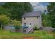 Backyard view featuring a private in-ground pool with a deck and home exterior at 946 Laurelwood Dr, Clover, SC 29710