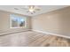 Spacious bedroom with wood floors, a window, and a ceiling fan at 946 Laurelwood Dr, Clover, SC 29710