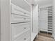Custom closet with built-in drawers, shelves, and ample storage space at 946 Laurelwood Dr, Clover, SC 29710