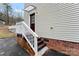 Side entrance features brick foundation, and covered front door entrance at 946 Laurelwood Dr, Clover, SC 29710