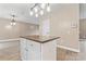 Kitchen island boasts ample storage and counter space, perfect for food preparation and serving at 946 Laurelwood Dr, Clover, SC 29710