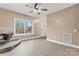 View of the living room shows the entrance and fireplace with lovely natural light at 946 Laurelwood Dr, Clover, SC 29710