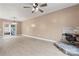 Bright living room features wood-look flooring, a fireplace and sliding doors to a deck at 946 Laurelwood Dr, Clover, SC 29710