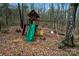 Backyard playground featuring a tall fort, slide, and swing set at 946 Laurelwood Dr, Clover, SC 29710