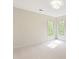Bedroom features neutral walls, soft carpet, and bright windows at 1006 Baldwin Ln, Waxhaw, NC 28173