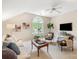 Cozy bonus room with vaulted ceilings, ample natural light, and comfortable seating arrangement at 1006 Baldwin Ln, Waxhaw, NC 28173