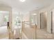 Upstairs hallway with lots of natural light at 1006 Baldwin Ln, Waxhaw, NC 28173