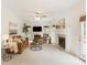 Spacious living room featuring a fireplace, neutral furniture, and ample natural light at 1006 Baldwin Ln, Waxhaw, NC 28173
