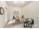 Well-lit office space with neutral decor, providing a quiet and functional workspace at 1006 Baldwin Ln, Waxhaw, NC 28173