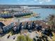 Beautiful aerial view of lakeside condos with private boat docks and tranquil community pool at 1008 Southwest Dr # 8, Davidson, NC 28036