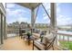 Enjoy the outdoors on this covered balcony with waterfront views and comfortable outdoor seating at 1008 Southwest Dr # 8, Davidson, NC 28036