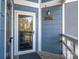 Charming entryway with glass front door and a clear view of the house number at 1008 Southwest Dr # 8, Davidson, NC 28036
