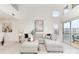 Bright living room with sectional sofa, lots of light, and access to outdoor balcony at 1008 Southwest Dr # 8, Davidson, NC 28036