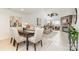 Bright open-concept living space with fireplace and access to outdoor balcony at 1008 Southwest Dr # 8, Davidson, NC 28036