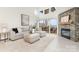 Inviting living room with stone fireplace and sliding glass doors to the outdoor balcony at 1008 Southwest Dr # 8, Davidson, NC 28036