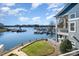 Lakefront view of waterfront condos, boat slips, and nicely landscaped grounds at 1008 Southwest Dr # 8, Davidson, NC 28036