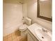 Clean and bright bathroom with white fixtures and tile flooring at 10905 Park Rd, Charlotte, NC 28226