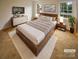 Cozy bedroom with plush carpeting, modern furnishings, and natural light at 10905 Park Rd, Charlotte, NC 28226