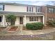 Charming two-story home with brick and vinyl siding and well-maintained landscaping at 10905 Park Rd, Charlotte, NC 28226