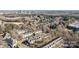 Community aerial view showcases the proximity to a golf course and mature trees at 11013 Dundarrach Ln, Charlotte, NC 28277
