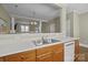 Open kitchen with view into the living room, featuring light countertops and stainless steel sink at 11013 Dundarrach Ln, Charlotte, NC 28277