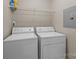 Laundry room with a washer, dryer and shelving at 11013 Dundarrach Ln, Charlotte, NC 28277