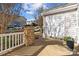 Charming patio features stacked stone accents and a cozy outdoor space at 11013 Dundarrach Ln, Charlotte, NC 28277