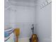 Walk-in closet features shelving and a vacuum cleaner at 11013 Dundarrach Ln, Charlotte, NC 28277