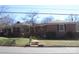 Charming brick home featuring a well-maintained lawn and inviting entrance in a desirable neighborhood at 121 Quincy Dr # 1, Belmont, NC 28012