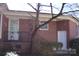 Classic brick home with well-maintained landscaping, offering timeless appeal and charm at 121 Quincy Dr # 1, Belmont, NC 28012