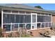 Relaxing screened porch with comfortable seating, perfect for enjoying the outdoors at 121 Quincy Dr # 1, Belmont, NC 28012