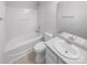 All white bathroom featuring a shower-tub combo and a single sink vanity at 13413 Glasgow Green Ln, Charlotte, NC 28213