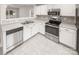 Well-lit kitchen featuring stainless steel appliances, gray counter tops and white cabinetry at 13413 Glasgow Green Ln, Charlotte, NC 28213