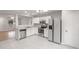 Spacious kitchen with stainless steel appliances and a view to another living space at 13413 Glasgow Green Ln, Charlotte, NC 28213