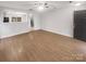 Spacious living room with hardwood floors and neutral paint at 13413 Glasgow Green Ln, Charlotte, NC 28213