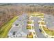 Community view featuring well-maintained homes, sidewalks, and green spaces at 15103 Honeycutt Dr, Huntersville, NC 28078