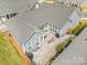 Aerial perspective of the home showcasing a patio, outdoor seating and landscaping elements at 15103 Honeycutt Dr, Huntersville, NC 28078