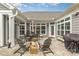 Inviting patio area with comfortable seating, outdoor dining set, grill and stylish pavers at 15103 Honeycutt Dr, Huntersville, NC 28078