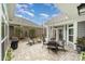 Outdoor space featuring a patio with grill, dining set, Adirondack chairs and decorative plant trellises at 15103 Honeycutt Dr, Huntersville, NC 28078