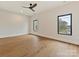 Bedroom with natural light offers hardwood floors, neutral walls, and recessed lights at 1516 N Caldwell St, Charlotte, NC 28206