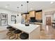 This kitchen features a large island, modern countertops, and stainless steel appliances at 1516 N Caldwell St, Charlotte, NC 28206