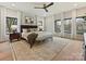 This bedroom boasts natural light with multiple windows and hardwood floors at 1516 N Caldwell St, Charlotte, NC 28206