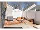 Cozy back patio with white fence, brick paver accents, AC unit, and plenty of privacy at 1517 Tiana Way, Rock Hill, SC 29732