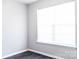 Bright bedroom featuring a large window that illuminates the room and dark wood-look floors at 1517 Tiana Way, Rock Hill, SC 29732