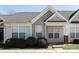 Charming townhome featuring classic architecture, manicured shrubs, and well-maintained landscaping at 1517 Tiana Way, Rock Hill, SC 29732